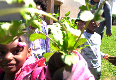 Child with Plant